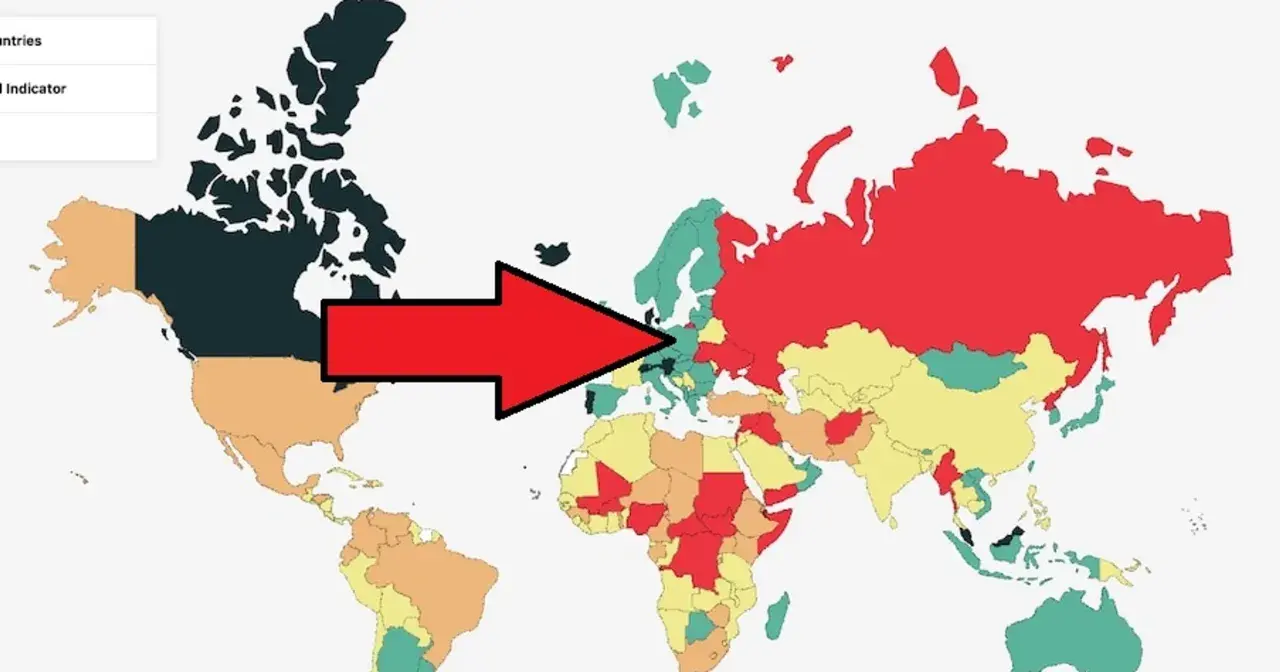 Czerwona strzałka wskazuje na Europę, gdzie niektóre kraje są zielone, sugerując, że są najbezpieczniejszym krajem na świecie.