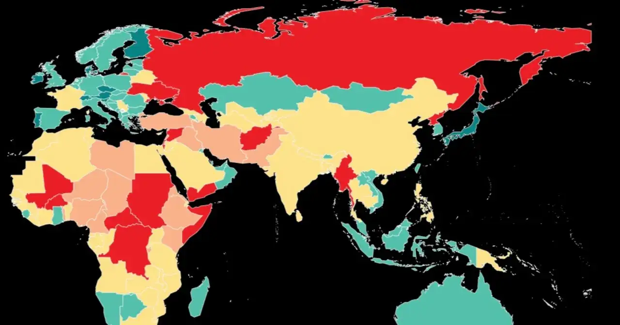 Mapa świata z kolorami wskazującymi poziom bezpieczeństwa. Europa Północna i Zachodnia to najbezpieczniejszy kraj w Europie, oznaczony na zielono-turkusowo.